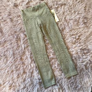 Leggings, size 0, gray with reptile pattern.Still has tags and never worn out